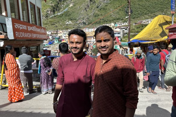 Medical manufacturing firm worker Atharv Gaikwad, 26, and his friend, lawyer Kaivalya Jarande, also 26, outside Badrinath temple.