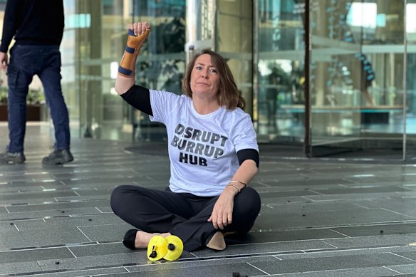 Disrupt Burrup Hub protester Kristen Morrissey outside Woodside’s headquarters in June 2023.