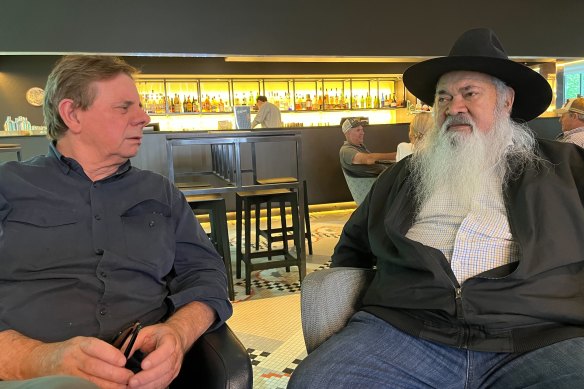 Tony Wright (left) shares memories of footy games at Monivae College in Hamilton with Senator Pat Dodson.