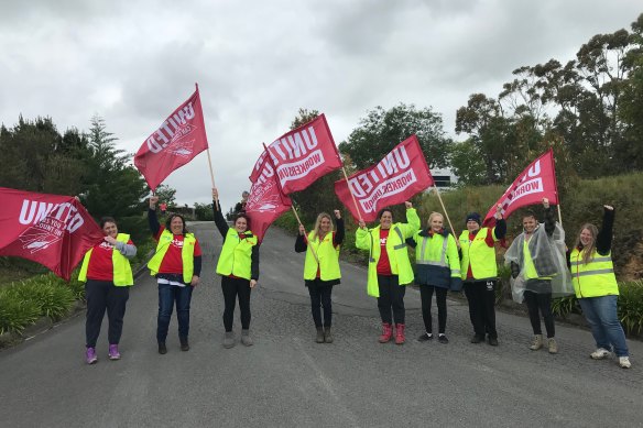United Workers Union members picket outside Jindi Cheese factory in Victoria. Tammy Norrie is pictured on far right.