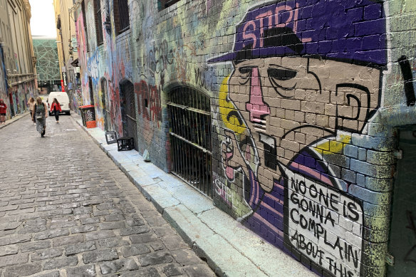 Adding to the debate: New graffiti art on Hosier Lane after the "paint-bombing".