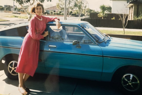 The cars of the past: one of Kate Halfpenny’s friends pictured in 1986 with her beloved Datsun 120Y.