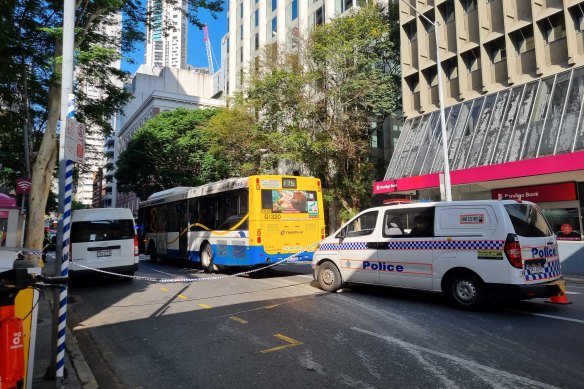 A woman has been his by a bus on Adelaide Street.
