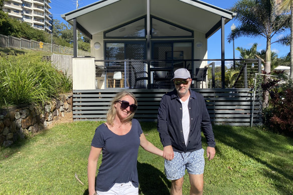 Kate Halfpenny and her husband Chris outside their rented cabin in Burleigh Heads.