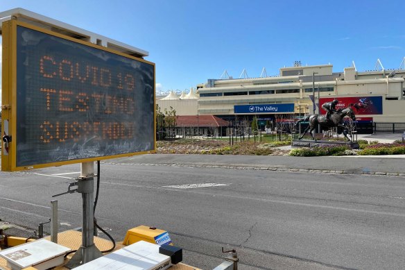 A testing site at Mooney Valley Racecourse closed after a traffic controller tested positive.