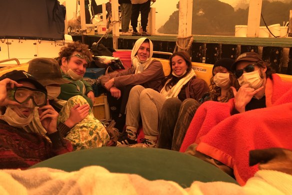 The "Mallacoota Nine" in their borrowed boat.