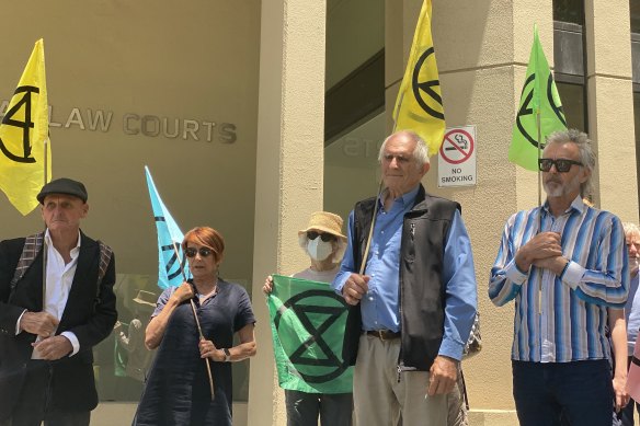 Four members of the ‘Burrup Five’ outside Perth’s Central Law Courts.