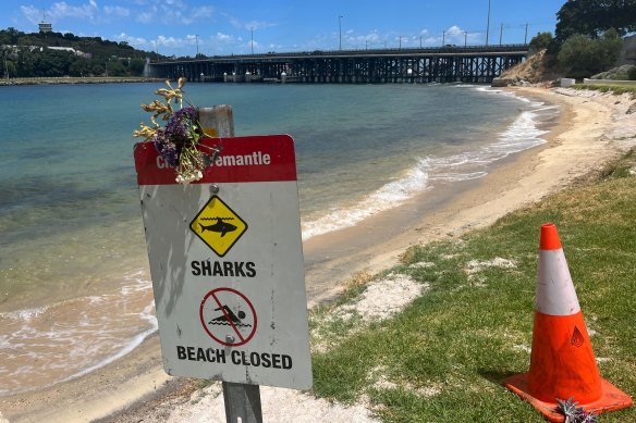 Flowers left by locals mourning Stella after the shark attack.