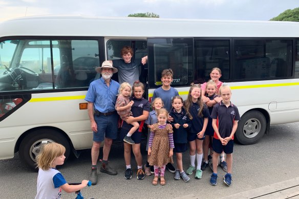 Roy Moriarty, far left, with kids on his last day on Thursday driving the school bus from Kennett River to Lorne on the Great Ocean Road.