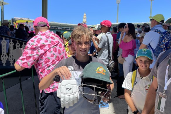 Brody Quin, 12, was lucky enough to score David Warner’s helmet and gloves in the opener’s final Test at the SCG.
