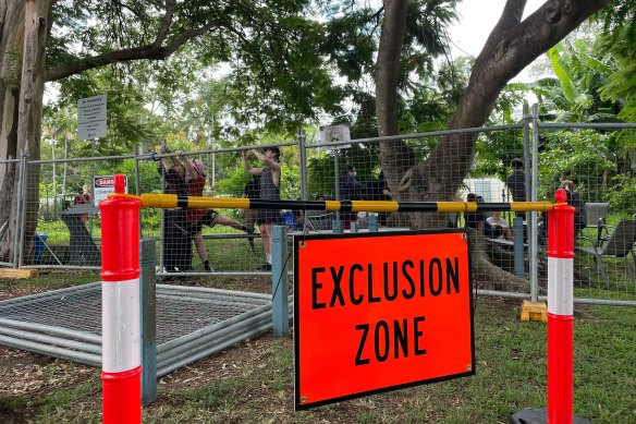 Concerned locals have gathered behind fences erected around Kurilpa Commons, a neighbourhood farm, on Friday morning to protect the site from being demolished.