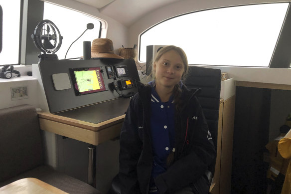 Greta Thunberg sits on a catamaran docked in Hampton on Tuesday.