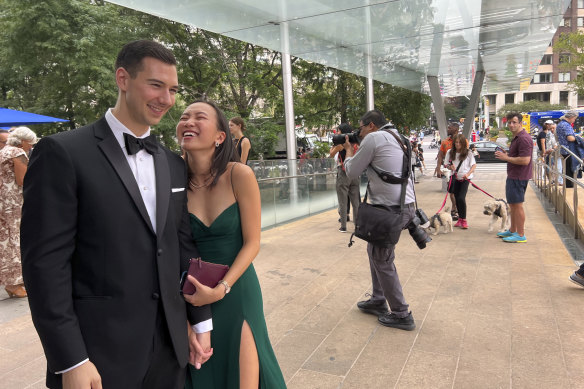 Alexander Fischer and Nina Oishi waiting to take part in the mass wedding.