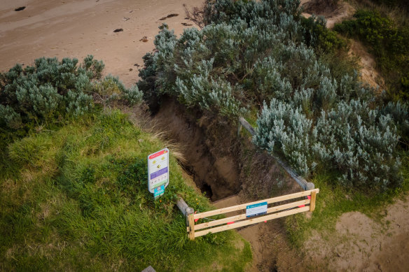 A path at Moggs Creek is closed due to erosion. 