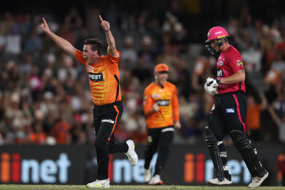 Jhye Richardson of the Scorchers celebrates taking the final wicket of Steve O’Keefe of the Sydney Sixers to win the Men’s Big Bash League match final