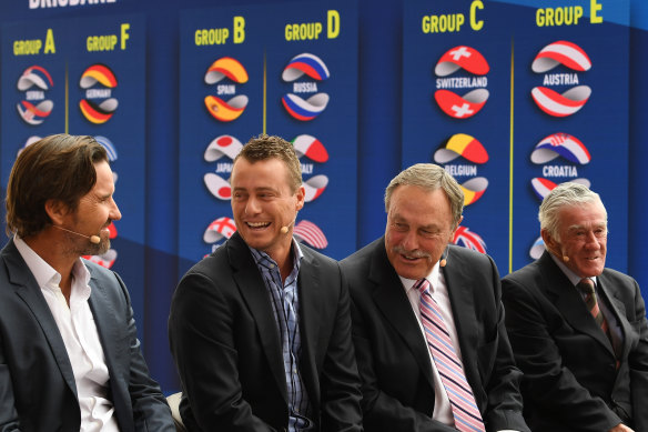 Pat Rafter (left), Lleyton Hewitt, John Newcombe and Ken Rosewall chat at the ATP Cup draw. 