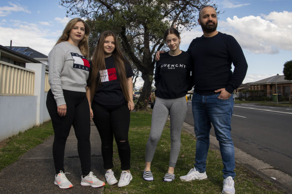 Nader Namo with his wife Wasen and daughters Angela and Natalie at their Bossley Park home. 