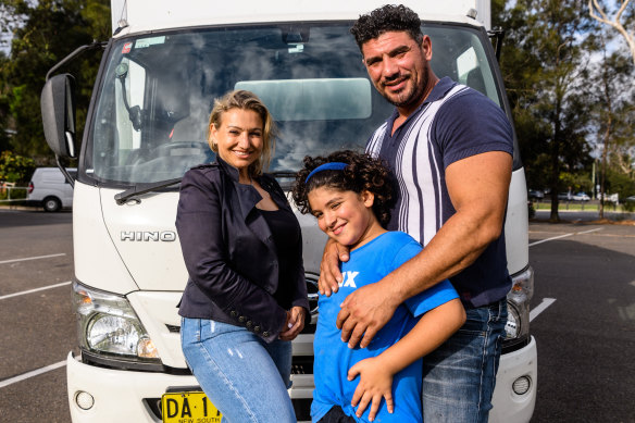 Alaa Khachan, with his partner Suzi and son Ali, and their truck.