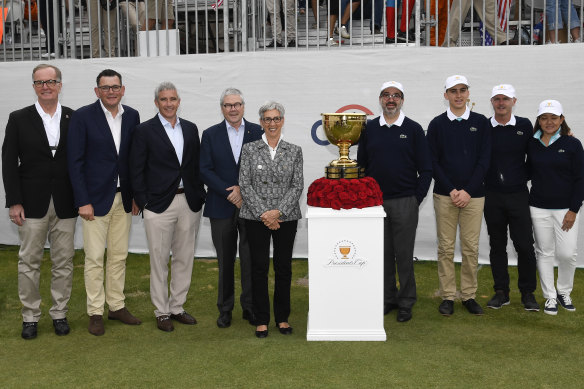 PGA Tour Commissioner Jay Monahan stands left of Andrews at the Presidents Cup Opening Ceremony at Royal Melbourne Golf Club in December 2019.