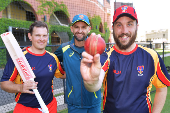 Nathan Lyon, centre, at the National Cricket Inclusion Championships on Wednesday. 
