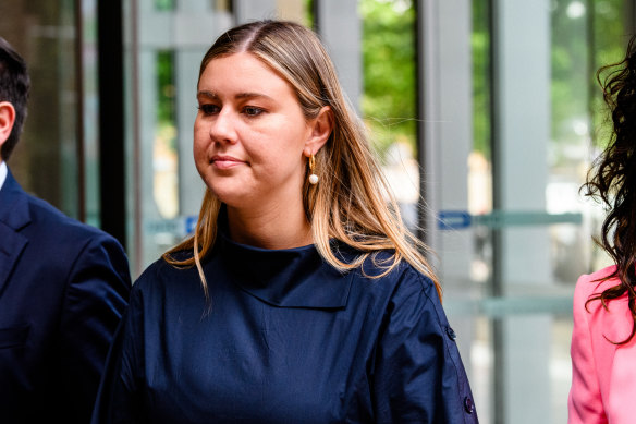 Brittany Higgins leaves the Federal Court in Sydney on December 1.