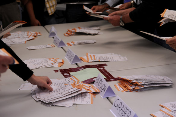 The VEC counting votes in 2010.