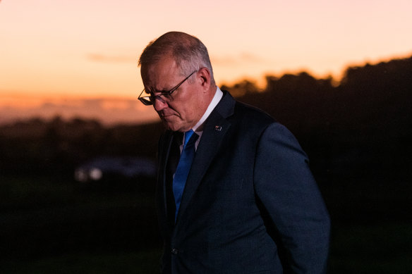 Australian Prime Minister Scott Morrison does a cross from Coolangatta Estate on the evening of him announcing  the Federal election.