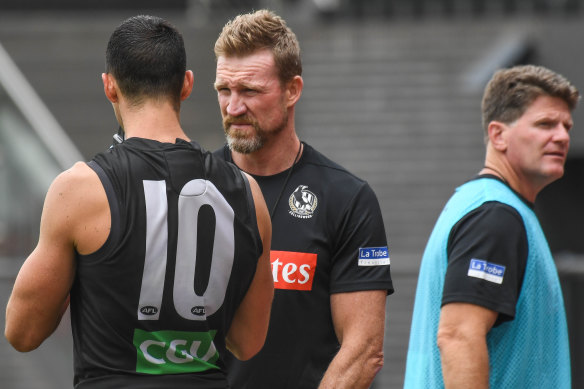 Coach and captain: Scott Pendlebury with Nathan Buckley.
