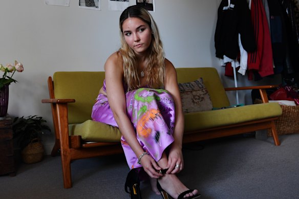 Year 12 student Jaimie Harrigan in the outfit she was planning to wear to her school formal, which has been cancelled under a government directive.