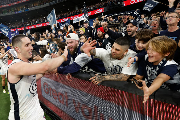 Jacob Weitering rejoices with fans after the semi-final win over Melbourne.