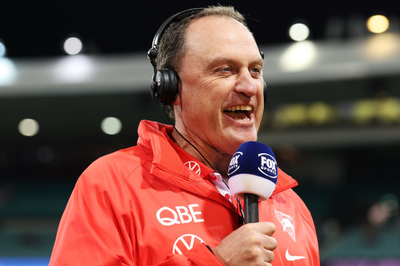 John Longmire will coach the Swans for the 300th time.