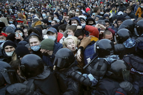 Demonstrators clash with police on Saturday during a protest against the jailing of opposition leader Alexei Navalny.