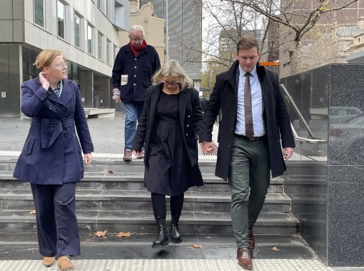 Simon Peckitt and Felicity Stewart, parents of two-year-old Harriet, leave the County Court in Melbourne on Friday.
