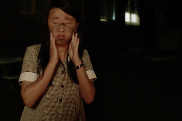 Gabby (Janet Wang) applies blackface in the 2013 short film Bloomers.