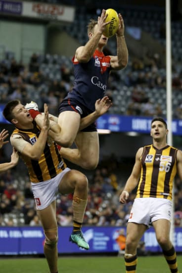 Screamer: Casey's Tim Smith flies high against the Hawks during the VFL grand final.
