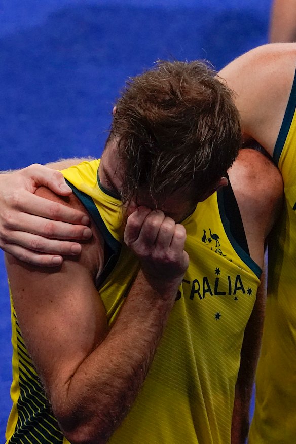 Jacob Whetton is comforted by a teammate after missing the last shot of the penalty shootout.