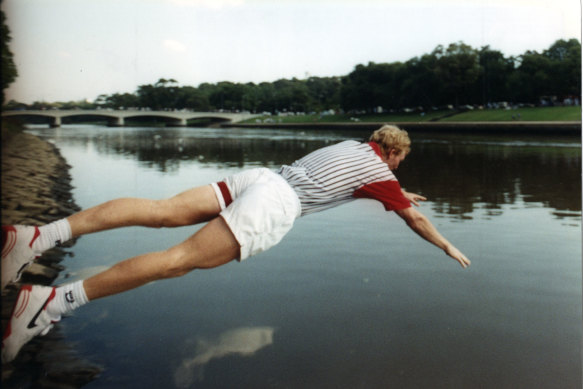Jim Courier takes a victory dip in the Yarra after winning the Australian Open in 1993. 