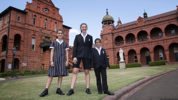 Santa Sabina College students Matilda Ball, Grace Campbell and Sophie Graham sport the new uniforms.