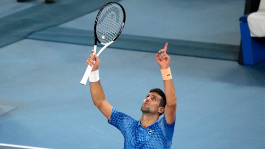 Novak Djokovic takes in his victory on Sunday night.