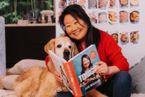 Nagi Maehashi with her dog Dozer and new book Tonight, which will be out on October 15.