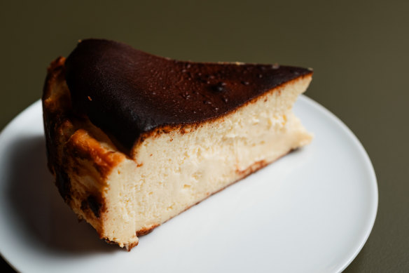 Basque cheesecake is served simply, with no adornment beyond its blackened crust.