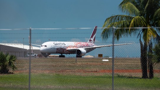 DARWIN, AUSTRALIA - OCTOBER 23: QANTAS FLIGHT QF110 touches down at RAAF Base Darwin on October 23, 2020 in Darwin, Australia. Eight repatriation flights have been arranged to help Australians stuck overseas due to the COVID-19 pandemic and border closures return home. Passengers will be immediately taken to the Howard Springs facility for 14 days’ mandatory quarantine. (Photo by Lisa McTiernan/Getty Images)