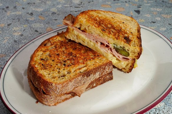 A classic from the sandwich bar: sourdough toastie with ham, cheese and pickles.