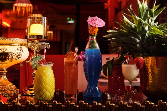 Tropical cocktails and mocktails headline the drinks list.