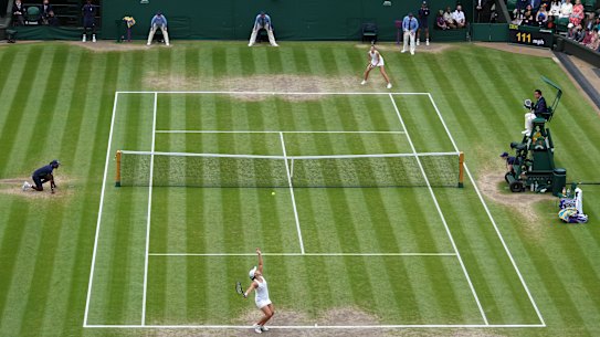 ONDON, ENGLAND - JULY 10: Ashleigh Barty of Australia serves during her Ladies’ Singles Final match against Karolina Pliskova of The Czech Republic  on Day Twelve of The Championships - Wimbledon 2021 at All England Lawn Tennis and Croquet Club on July 10, 2021 in London, England. (Photo by Mike Hewitt/Getty Images)