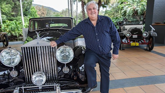 Clive Palmer at the Palmer Coolum Resort with a car from his vast car collection.