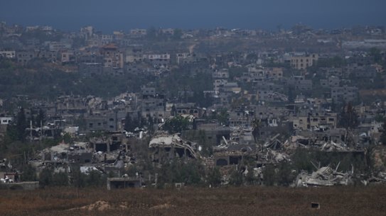 Destroyed buildings in the Gaza Strip, as seen from southern Israel, Friday, May 24, 2024. (AP Photo/Tsafrir Abayov)