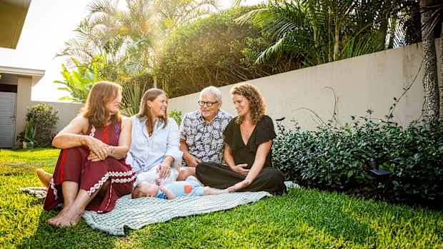 Ross Lamb, with wife Lyndsay, left, daughters Elle, centre, and Matilda, right, and grandchild Arlo.