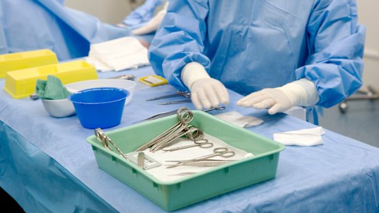 Surgical Link was launched to ease pressure on Queensland's elective surgery waiting list, but some public patients say they are being left out of pocket.