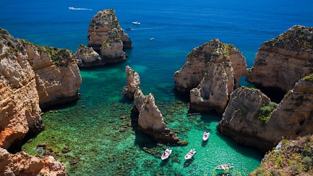 Swap yachts on the French Riviera for shades of turquoise on the Lagos Coast, Portugal.